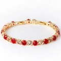 Detail of 6mm gold tennis bracelet featuring alternating red and clear square-cut zircons - Red & White Zircon Gold