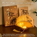 DIY bamboo ink fan-shaped book lamp with LED light, tassel and elegant box - Zhuxi Thatched Cottage