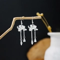 Silver flower earrings with long tassels and bell pendants in a bohemian style - Petal Bell Leaf Long Tassel Style (E5379)