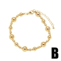 Bracelet élégant plaqué or 18 carats avec perles rondes lisses et facettées alternées - Style Artisanal de Collage de Perles Dorées Grandes et Petites (B)