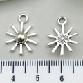 Silver sun pendants for DIY jewelry making shown with measurement ruler for size accuracy - Sun 18x14mm
