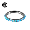 G23 titanium nose hoop ring featuring synthetic blue opal inlay in a gunmetal finish - OP05 Side Surface
