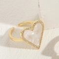 Adjustable golden ring with heart-shaped white shell inlay and zircon accents - Heart Shell