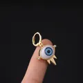 Ethnic style golden evil eye earring with blue iris detail and sparkling stones - Blue Pupil Spiked Eye (12#)