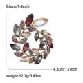 Elegant crystal olive wreath brooch with multi-colored stones on a white background - Brown