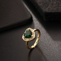 Adjustable golden ring featuring a heart-shaped emerald green zircon and diamond halo - Halo Heart Green Gem Style