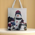 Detailed close-up of Christmas snowman family print on a durable canvas tote bag - Style 24