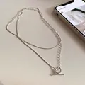 Collana doppia in argento con catena a serpente e chiusura a barra OT dal design minimal - Collana OT a Doppio Strato