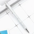 Sparkling silver glitter ballpoint pen with polished metal accents on grid background - White Scale (Silver Trim)