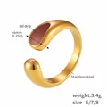 Detail of gold-plated stainless steel ring showing brown oil drip design and 6mm width - Size 7 / Brown Enamel Open Style (A584) / Gold