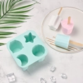 Mint green 4-cavity silicone ice cream mold with star and flower shapes and wooden sticks - XG-14 (4 Holes Cartoon) / Mint Green
