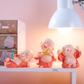 Three cute little monk resin car ornaments in orange robes with expressive poses - Large Little Monk Collection (W1222-1)