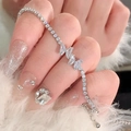 Silver butterfly crystal tennis bracelet with sparkling rhinestones on model wrist - Silver Butterfly Zirconia Tennis Chain (MY32133)