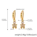 Golden stainless steel astronaut earrings with 5A cubic zirconia stones in detailed pave setting - Gold-Q136