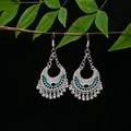 Detailed view of vintage silver tassel earrings with green glaze on a dark branch - Silver Long Vintage Hook(E5011)
