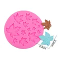 Pink silicone maple leaf mold with detailed vein textures for DIY fondant or clay crafting - Pink