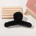 Close-up of large black plush hair claw clip on soft background for winter styling - 14cm Large Plush Claw - Black
