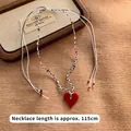 Detail of red heart pendant necklace with colorful woven cords measuring 115cm length - Red Heart Pendant Braided Rope Style (9# Necklace-Red-Heart)