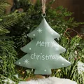 Green metal Christmas tree ornament with hand-painted Merry Christmas script and twine - Green Christmas Tree Style