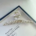 French tortoise shell acetate hair claw clip in elegant cream and light brown marble pattern - Rice White