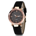 Women's rose gold quartz watch with a black glitter dial and leather strap on white background - Black