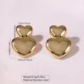 Golden double heart stacked stud earrings in polished stainless steel for women - Heart Stacked Design (FYD6125)