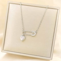 Silver safety pin necklace with a sparkling pink heart pendant on satin lining - Heart Safety Pin Pendant / Silver Pink