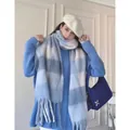 Blue and white plaid faux cashmere scarf with tassels styled with a winter knit outfit - Blue White Plaid
