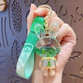 Schattige groene konijnen-acryl sleutelhanger met glitter en geweven polsbandje - Vloeibare Speler No.1 Hanger - Groen
