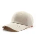 Beige Baumwoll-Baseballkappe im Vintage-Stil mit abgenutztem Schirm und Nähten - Beige