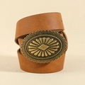 Brown leather belt for women featuring an engraved bronze oval buckle with radial patterns - Style 19693 / Small (101cm) / Bronze Camel