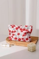 Close-up of red cherry print makeup bag with zipper on a wooden decorative tray - Large (26x18cm) / Red Cherry Large