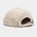 Beige cotton docker hat with smiley face embroidery and adjustable metal buckle strap - U Smile Beige