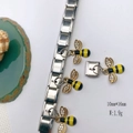 Detailed macro view of bee charms with gold enamel and crystals for modular bracelets - Model 123-Bee