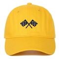 Close-up of checkered racing flag embroidery on a bright yellow twill cotton baseball cap - Yellow