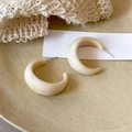 Fashionable C-shaped resin hoop earrings with creamy amber marble texture and silver pins - White