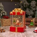 Red Christmas gift box lantern with Santa Claus figurine and sparkling snow effect - Fixed Gift Box Santa