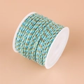 Braided cotton cord in blue and green fiber with gold metallic thread on a roll - No.5 Light Sky Blue