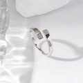 Polished silver adjustable open ring with sparkling zircon squares on a water background - Silver Small Square