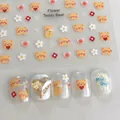 Detail of YO-020 nail art stickers featuring yellow bears and floral patterns - YO-020 Bear