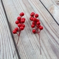 Artificial red berry stems with 14 forks for Christmas home decor on wooden background - Red