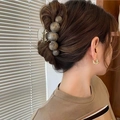 Elegant grey beaded hair claw clip styled on woman's hair in natural light - Transparent with Starry Gray