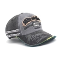 Close-up of vintage washed denim baseball cap with Rockstar embroidery and distressed holes - Adjustable / Dark Gray