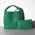 Green woven bucket bag with matching zipper pouch interior on minimalist background - Racing Green