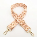 Detail of adjustable bohemian bag strap with orange geometric pattern and gold hardware - Orange