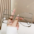 Lunettes de soleil oversize argentées avec détails de perles élégantes sur les branches - Monture Argentée Blanc Transparent
