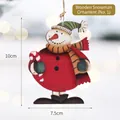 Wooden Christmas snowman hanging ornament with red coat and cane for holiday decor - 10x7.5cm
