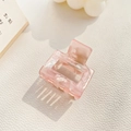 Pink marble acetate square hair claw clip with cutout design for high ponytail styling - Marbled Pink