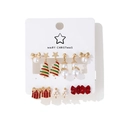12-piece Christmas earring set with snowman, tree, and bow designs on white card - 12 Pairs Christmas Stud Earrings Set