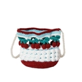 Detail of hand-crocheted bucket bag featuring 3D cherry motifs and faux pearl strap - Red